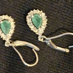 Earrings emerald and diamond drop earrings.